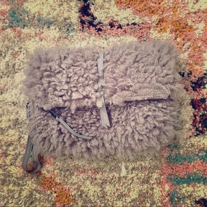 Faux sheepskin clutch